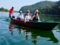 Tourists enjoy boating in Phewa Lake