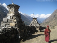 A monk going through chorten