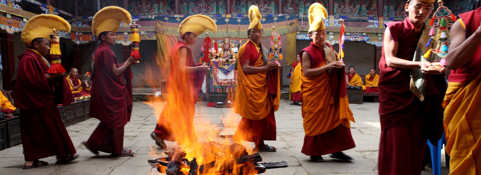 Monks performing fire puja during Mani Rimdu at Tengboche